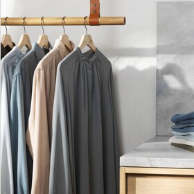 Shirts on a clothes rack.