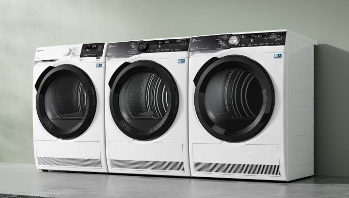 Three different Electrolux tumble dryers are placed next to each other